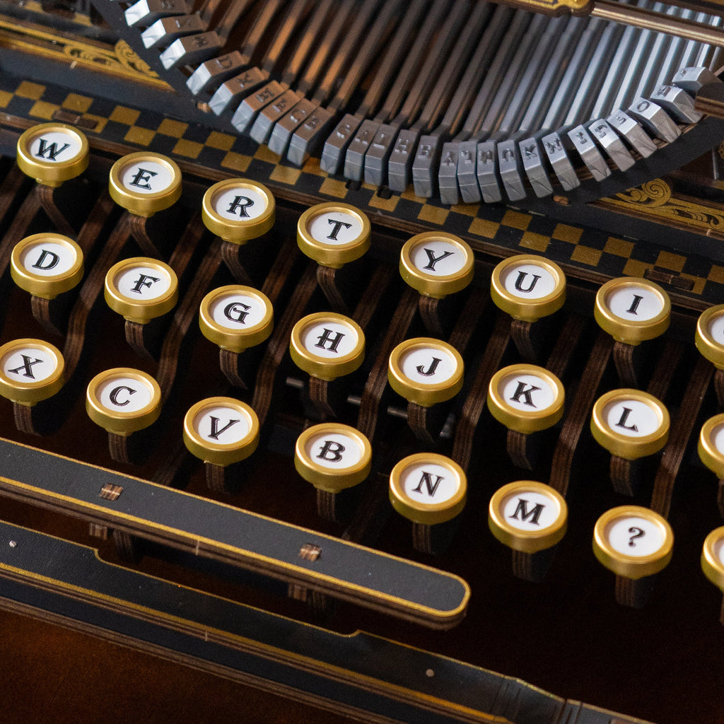 Wooden typewriter kit, side view of the carriage
