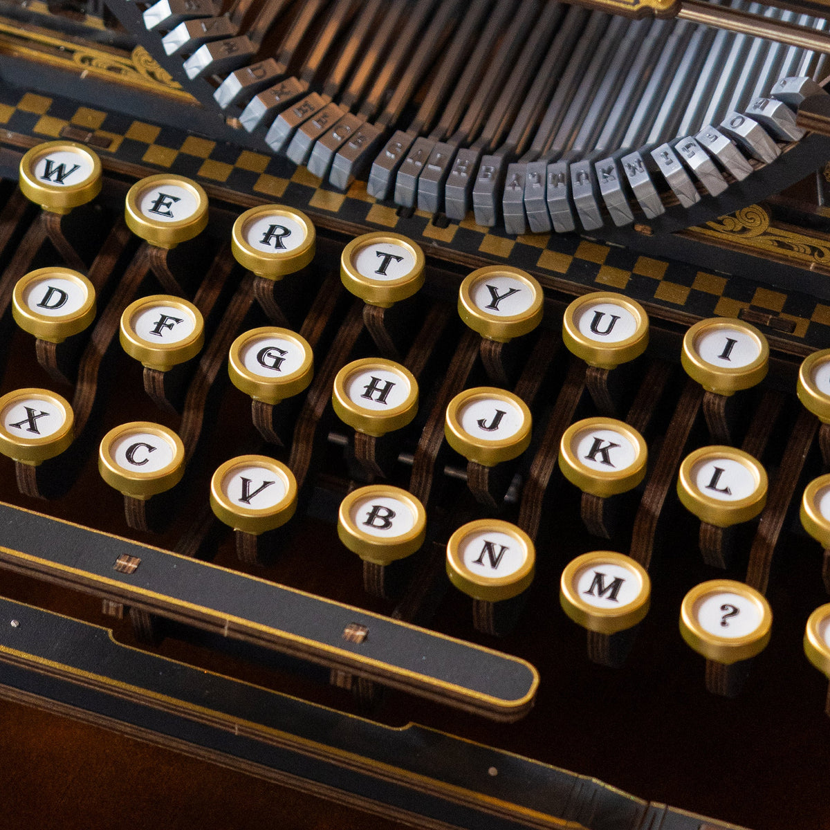 Wooden typewriter kit, side view of the carriage