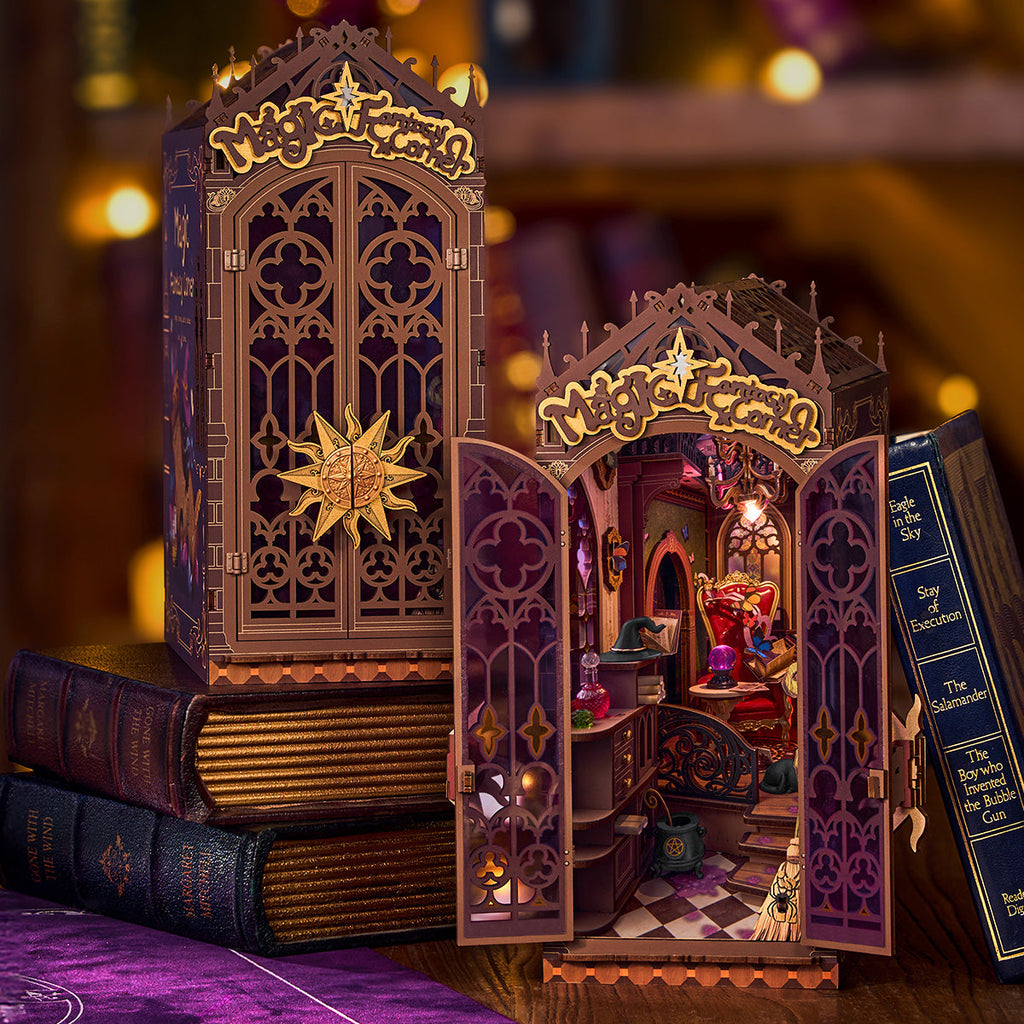 The Witch's Corner book nook, fully assembled with lights on