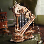 Swan wings and colored gears of the harp music box